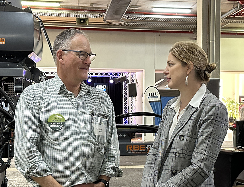 Grower Ian Hayllor chats to new federal Agriculture Minister Julie Collins